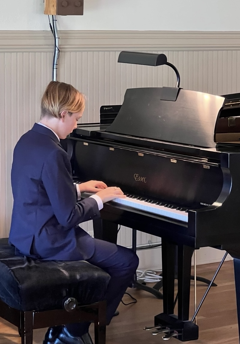 Bright Keys Piano Studio student playing piano during lesson